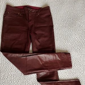 1199 Womens mid rise coated skinny jeans